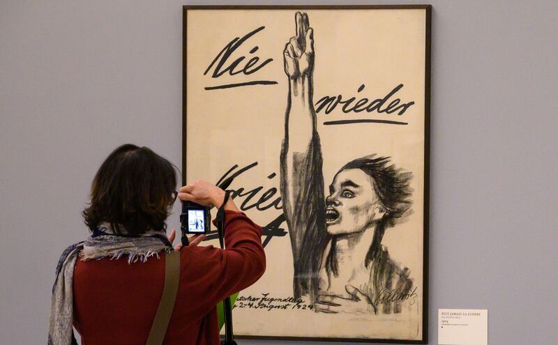  German artist Käthe Kollwitz's sketch of a young man with two fingers aloft, swearing an oath: “Nie wieder Krieg”, no more war. Photograph: Getty Images
