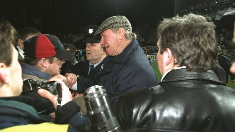 Ireland manager Jack Charlton remonstrates with an England fan after the friendly international at Lansdowne Road was halted due to rioting by the visiting fans in February 1995. Photograph: Shaun Botterill/Allsport