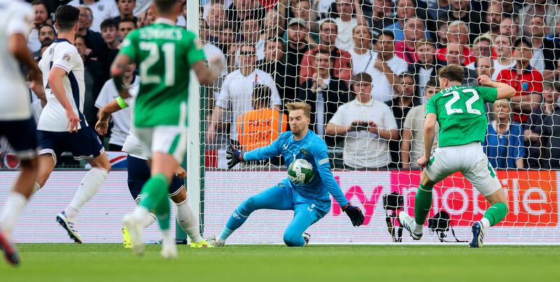 Ireland goalkeeper Caoimhín Kelleher saves a shot from England captain Harry Kane. Photograph: James Crombie/Inpho