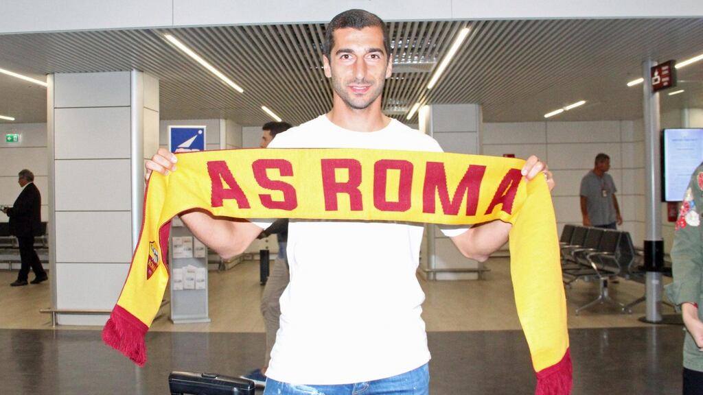 Henrikh Mkhitaryan poses for photographers upon his arrival in Rome to sign for AS Roma. Photograph: EPA