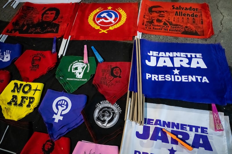 Merchandise for sale during a campaign rally for Jeannette Jara. Photograph: Tamara Merino/Bloomberg