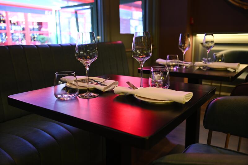 Laid tables inside La Vespa. Photograph: Bryan Meade