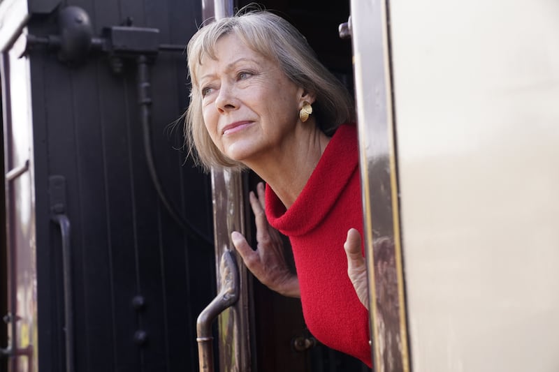 Jenny Agutter on a train at Oakworth Station in West Yorkshire to attend the world premiere of The Railway Children Return in Keighley. Photograph: Danny Lawson