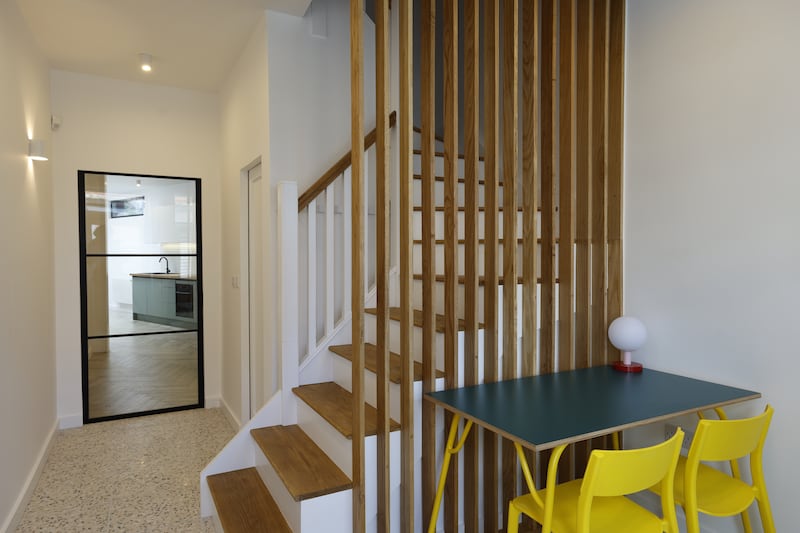 The table from Nick Taaffe's father's old business premises with two chairs bought from a local charity shop. Photograph: Nick Bradshaw/The Irish Times