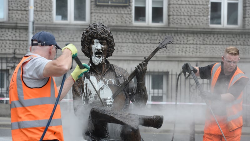 Dublin City Council curtails street cleaning to save water but no let off for graffiti