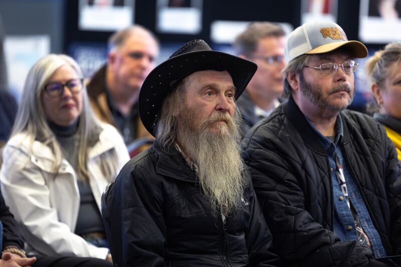 Observers listen as Wisconsin supreme court candidate Brad Schimel speaks during a campaign stop in Kronenwetter. Photograph: Scott Olson/Getty Images