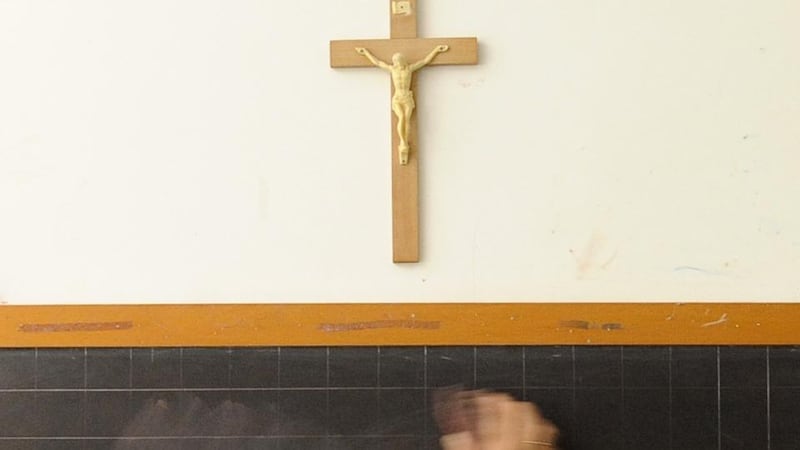 NUI Galway study notes all teachers in Catholic primary schools are required to obtain a Catholic certificate in religious studies and to teach the Catholic religious education curriculum. Photograph:  Tiziana Fabi/AFP