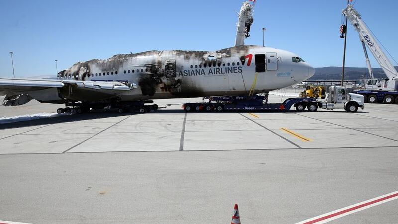 The wrecked fuselage of Asiana Airlines flght 214 sits in a storage area at San Francisco International Airport. Photograph:  Justin Sullivan/Getty Images.