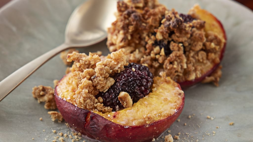 Baked nectarines filled with blackberries, then topped with an amaretti and hazelnut crumble