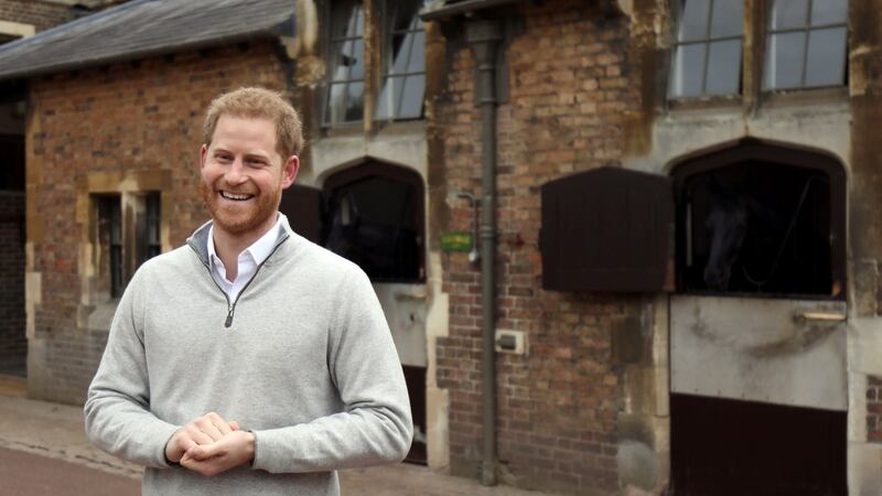 Britain’s Prince Harry speaks to members of the media at Windsor Castle following the announcement that Meghan, Duchess of Sussex, has given birth to a son. Photograph:  Steve Parsons/AFP/Getty Images
