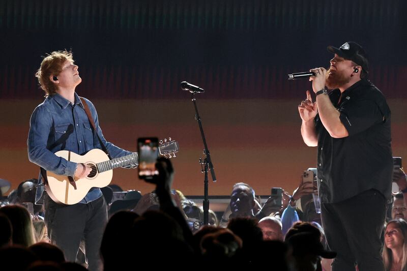 Ed Sheeran (left) and Luke Combs perform onstage during the 58th Academy Of Country Music Awards in Frisco, Texas, in May 2023. Photograph: Theo Wargo/Getty Images