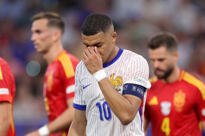 Kylian Mbappé of France looks dejected as he leaves the field after defeat to Spain. Photograph: Alex Livesey/Getty