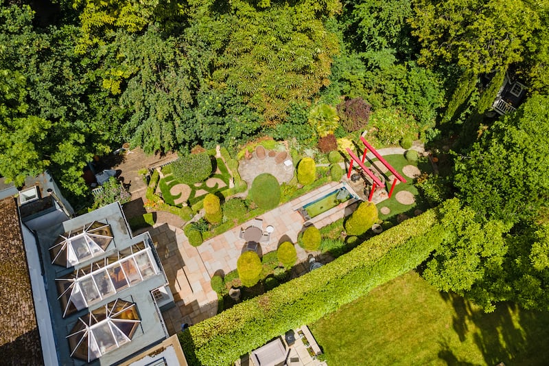 Aerial view of the rear garden and conservatory