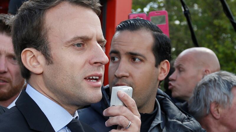 Emmanuel Macron, then a candidate for the French presidency, pictured with his security aide  Alexandre Benalla on April 26th, 2017. Photograph:  Pascal Rossignol/Reuters