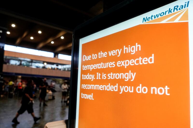 A board warning the rail passengers about the high temperatures and its impact on the rail traffic is pictured at Euston train station in central London on Tuesday. Photograph: Niklas Halle'n/AFP