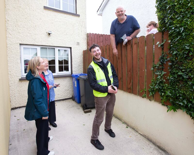 Green Party candidates Pauline O'Reilly and Adam Ó Cealaigh speak with Alice Shiels and her neighbour Patrick McPolin in Ballinamore, Co Leitrim. Photograph: Brian Farrell