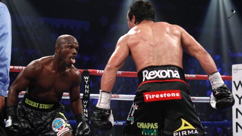 Timothy Bradley Jr. taunts  Juan Manuel Marquez  during their title fight in Las Vegas, Nevada.  Photograph: Steve Marcus/Reuters