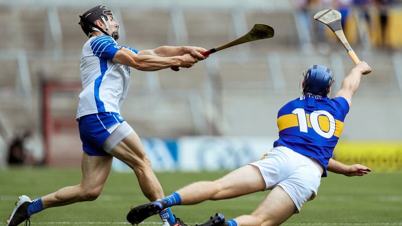 Waterford’s Jamie Barron is challenged by Jason Forde of Tipperary during the All-Ireland hurling quarter-final at Páirc Uí Chaoimh. Photograph: Brian Reilly-Troy/Inpho