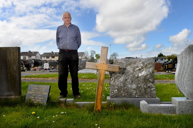 Brian Sclanlon, caretaker, Sligo city cemetery at the unmarked grave of Peter Bergmann in 2009. Photograph: Alan Betson/The Irish Times

