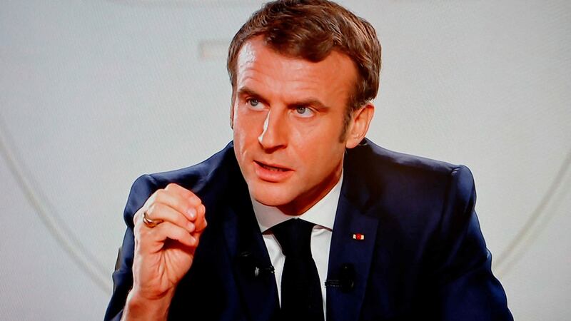 Emmanuel Macron answers questions during a televised interview at the Élysée Palace in Paris. Photograph: Ludovic Marin/AFP via Getty