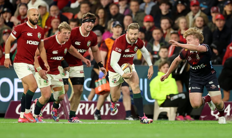 Elliot Daly charges forward for the Lions against Queensland Reds. Photograph: David Rogers/Getty Images