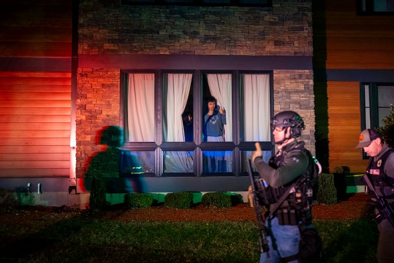 Hundreds of police officers swarmed the streets near Brown University on Saturday night in search of a gunman who opened fire on students in a campus building. Photograph: Christopher Capozziello/New York Times