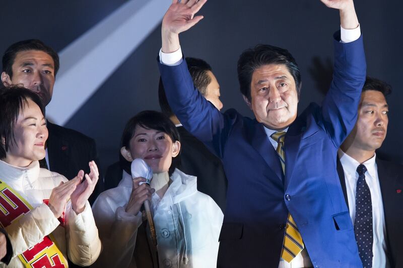 Japanese voters return prime minister Shinzo Abe to power