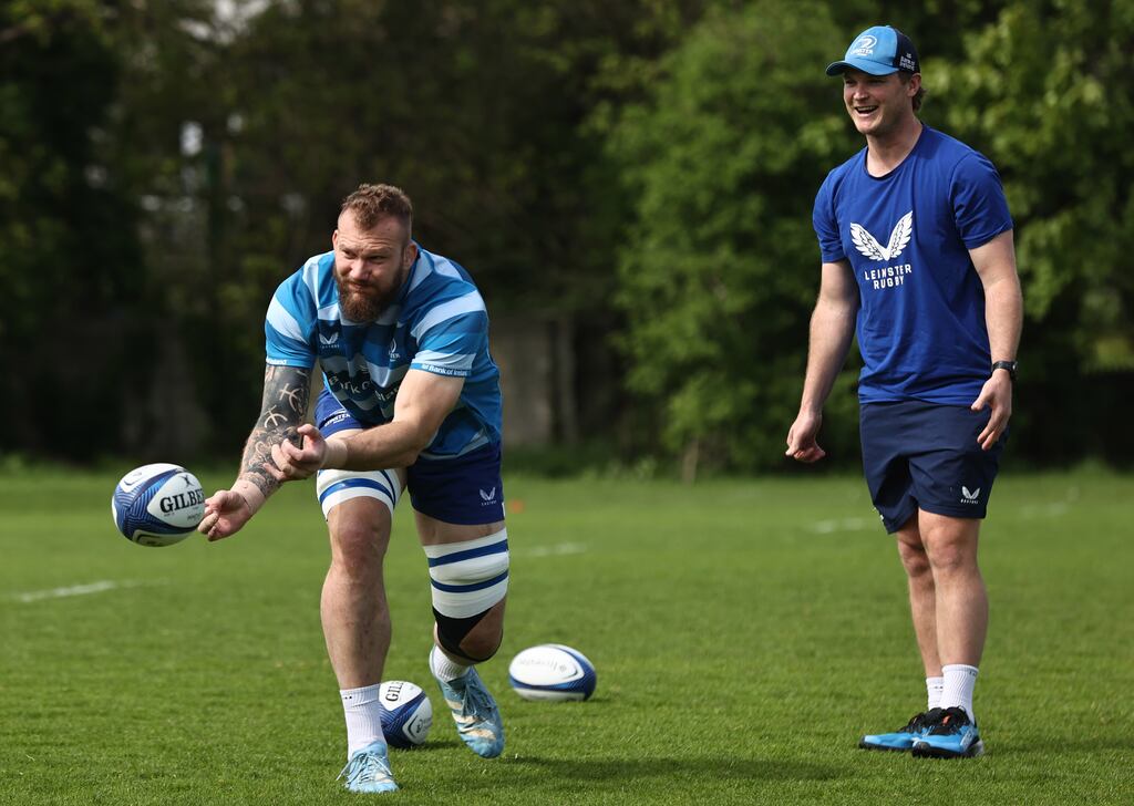 RG Snyman and Leinster assistant coach Tyler Bleyendaal during Monday's training session at UCD. Photograph: Tom Maher/Inpho