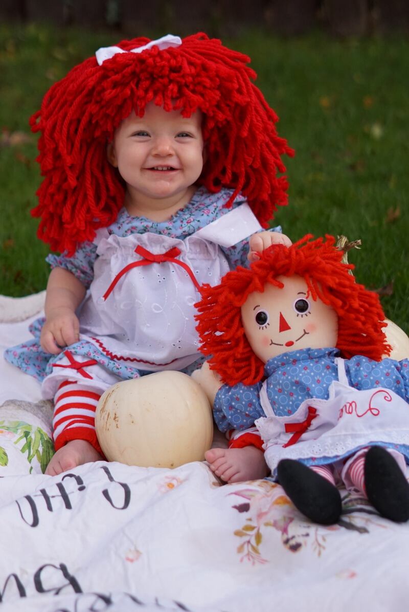 Natasha O’Neill’s first halloween, dressed up in her handmade Raggedy Ann costume. Does this mean double treats and double sweets?