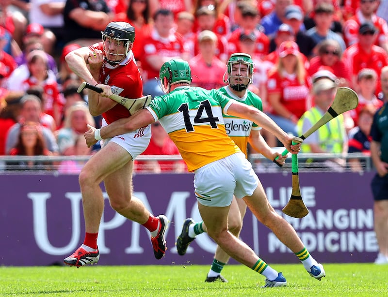 Cork's Eoin Downey with Brian Duignan of Offaly in the 2026 All-Ireland quarter final. Photograph: Tom O'Hanlon/Inpho