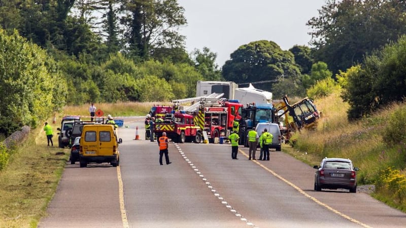 Emergency services at the scene of a fatal road incident on the Sligo to Dublin road, near Castlebaldwin, where an articulated truck struck a council-operated hedge trimmer, killing one worker. Photograph: James Connolly/PicSell8