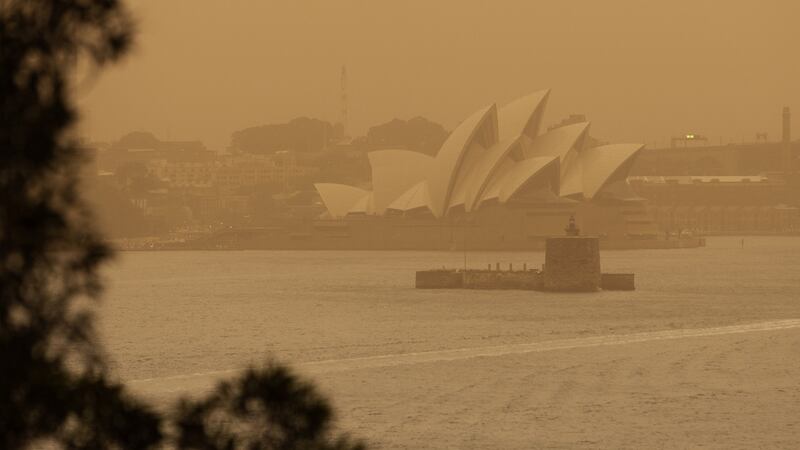 A smoke haze from the bushfires shrouds the Sydney Opera House. Photograph: Paul Braven/ EPA