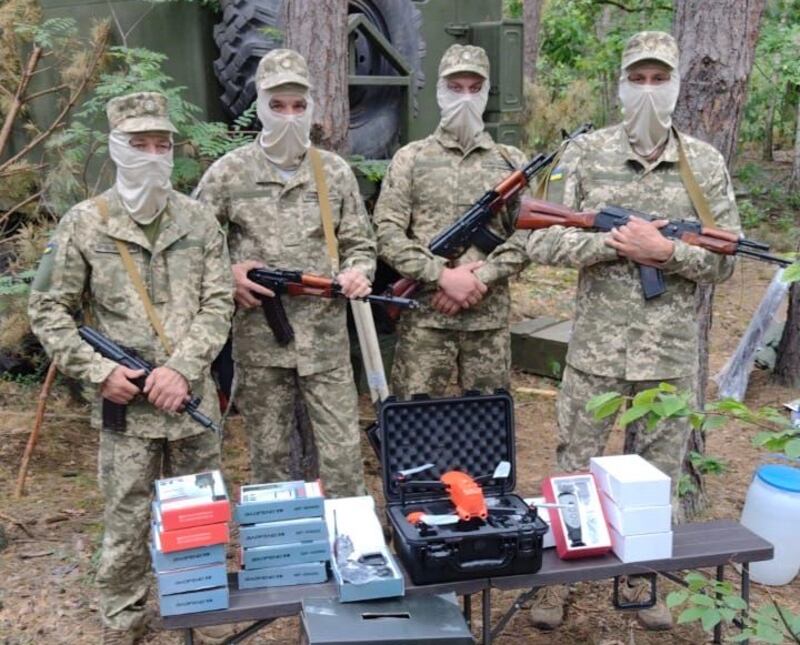 Ukrainian troops with equipment bought with donations to the Serhiy Prytula Foundation, one of the country's many crowdfunding projects. The guns were not provided as part of the project. Photograph: Courtesy of Serhiy Prytula Foundation 