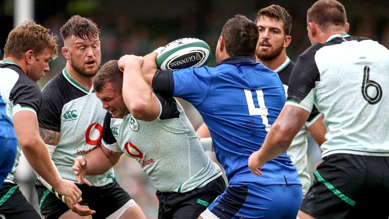 Ireland’s Andrew Porter and Jack McGrath with Alessandro Zanni of Italy in Saturday’s Guinness Summer Series match at the Aviva Stadium in Dublin.  Photograph: Dan Sheridan/Inpho