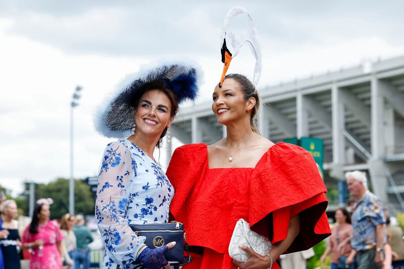 Kathy Langley, a milliner from Co Tipperary, with Linda Vittone, from Co Meath, enjoying Ladies' Day at the RDS. Photograph: Conor Ó Mearáin/Collins Photo Agency