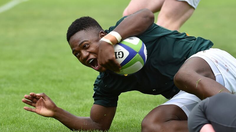 South Africa’s center Wandisile Simelane scored a hat-trick against Ireland Under-20s. Photograph: Remy Gabalda/AFP