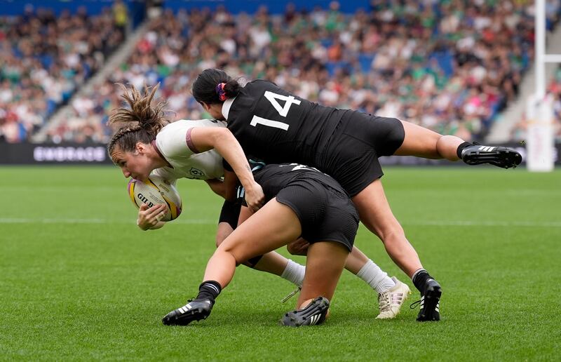 Ireland's Eve Higgins (left) is double-teamed against New Zealand. Photograph: Andrew Matthews/PA Wire