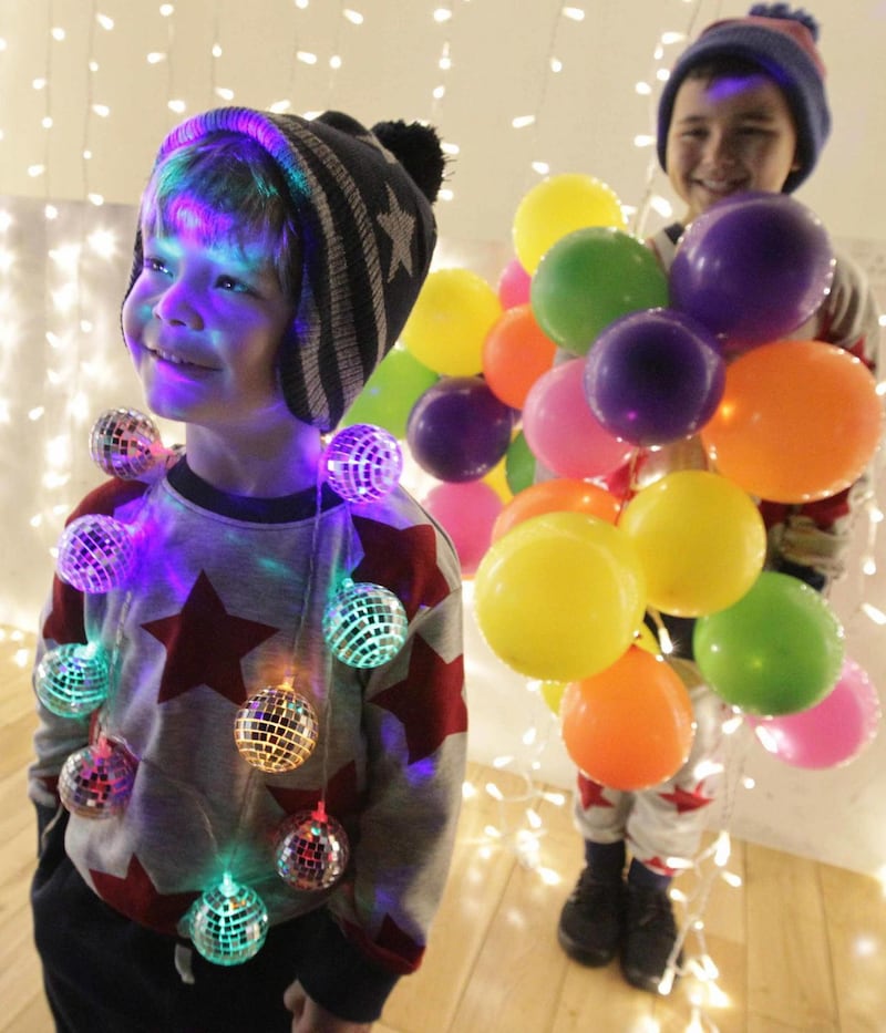 Cousins Luc Nanena Leen (8)  and Marco Acosta (3) from Dublin  at the launch of Dublin City Council’s annual Glow event in Smithfield Square. Photograph: Mark Stedman