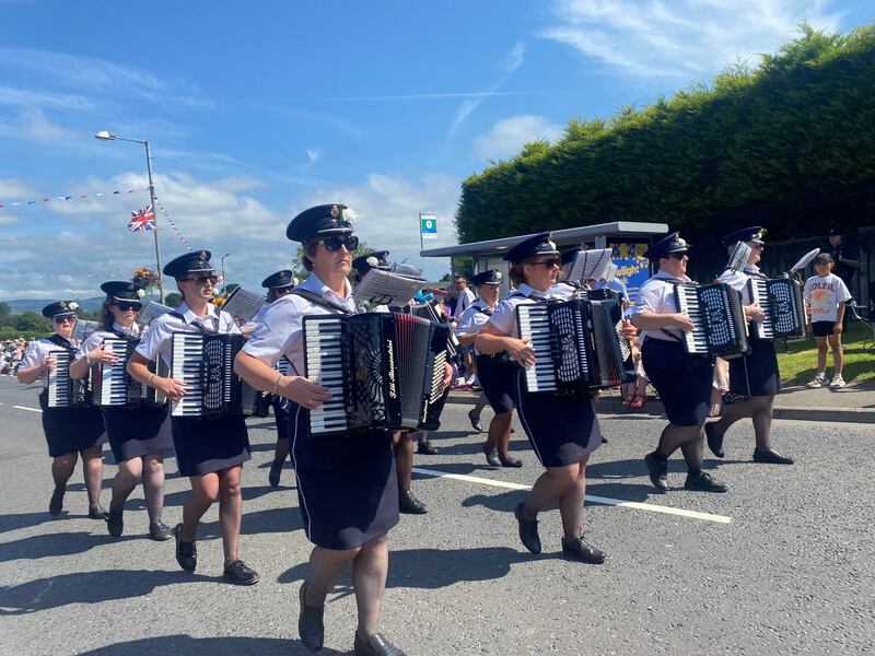 Participants in the Orange Order parade in Royal Hillsborough, Co Down. Photo: Jonathan McCambridge/PA