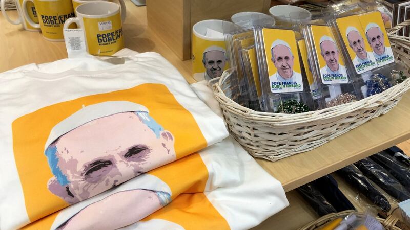 News T-shirts and mugs among some of the range of Pope Francis memorabilia and souvenirs on sale at the Veritas store on Dublin’s Abbey Street. Photograph: Bryan O’Brien/The Irish Times