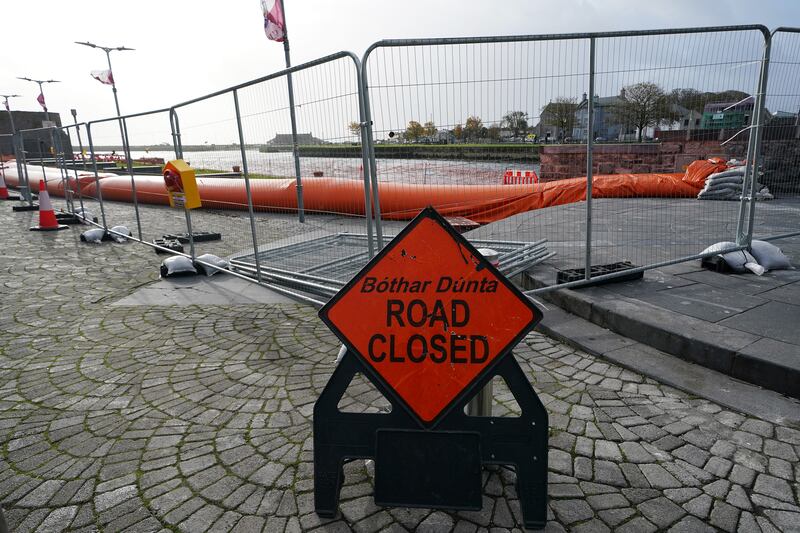 A road sign and flood defence in Galway city centre. Photograph: Brian Lawless/PA