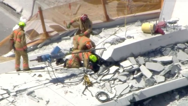 Emergency crews search for victims at the scene of a collapsed pedestrian bridge at Florida International University in Miami, Florida, on Thursday. Videograb: WTVJ-NBC/Reuters