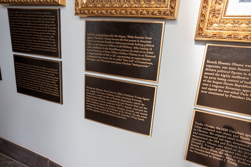 A text description for US president Donald Trump’s first term under his portrait. Photograph: Doug Mills/The New York Times