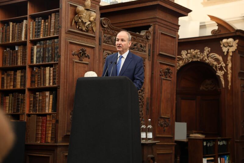 Taoiseach Micheál Martin in the Wren Library, Trinity College, Cambridge, to mark the appointment of Prof Alvin Jackson to the first Childers Professor of Modern Irish History Cambridge University.