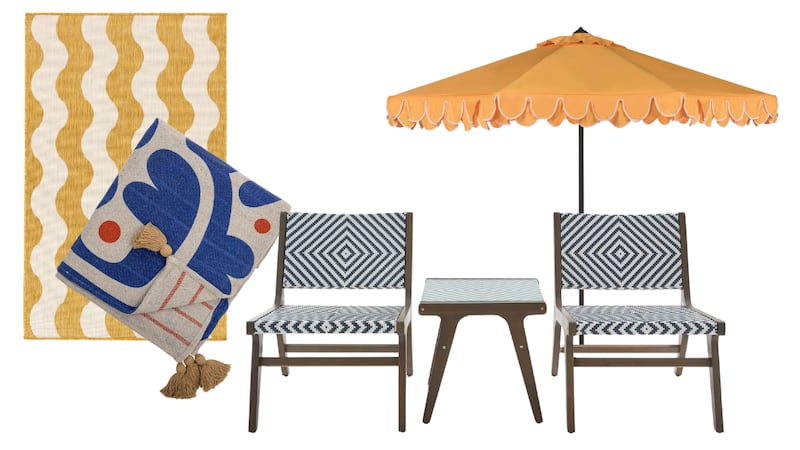 Sink in: Mare indoor outdoor rug, €79, rugvista.ie; Bloomingville Eviaya throw, €22.90, nordicnest.com; Brisbane garden bistro set, €589.99, very.ie; parasol, €206.99, wayfair.ie