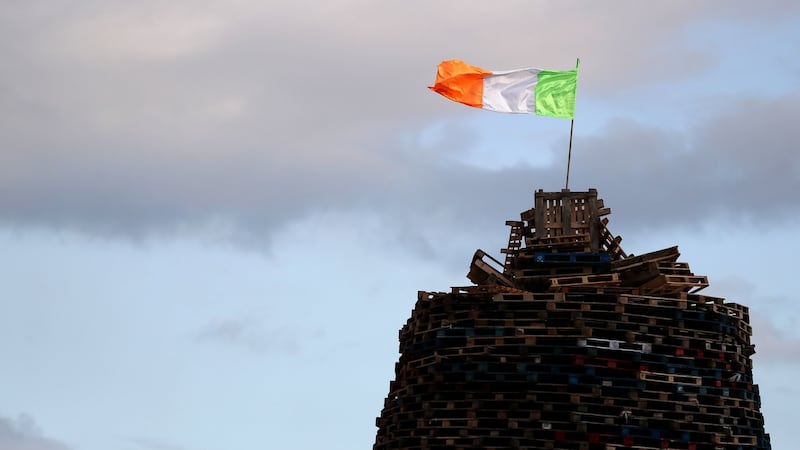 A  tricolour on top of a bonfire in the Sandy Row area of Belfast before  “Eleventh night” on July 11th. Photograph: Brian Lawless/PA