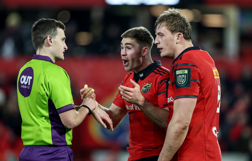 Munster's Jack Crowley and Gavin Coombes appeal to referee Peter Martin during the game against Leinster. Photograph: Dan Sheridan/Inpho
