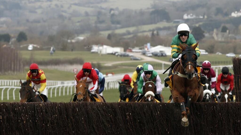 AP McCoy on the way to victory with Uxizandre in the The Ryanair Steeplechase at Cheltenham. Photo: Adrian Dennis/AFP/Getty