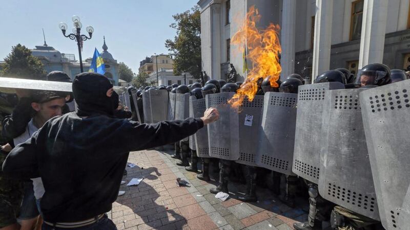 Close to 50 policemen were injured, four critically, during the clashes, the national guard reported in a statement on Monday. Photograph: Sergey Dolzhenko/EPA