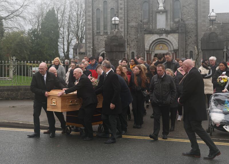 The remains of Mary Holt (60) are taken from St. Mary's Church, Edenderry for burial following requiem mass on Sunday.  Photo: Bryan O’Brien / The Irish Times 